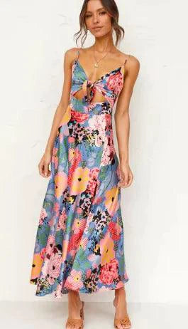Mandotos floral boho chic midi dress with a flowy silhouette, featuring vibrant floral patterns and a relaxed fit.