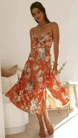 Mandotos floral boho chic midi dress with a flowy silhouette, featuring vibrant floral patterns and lightweight fabric.