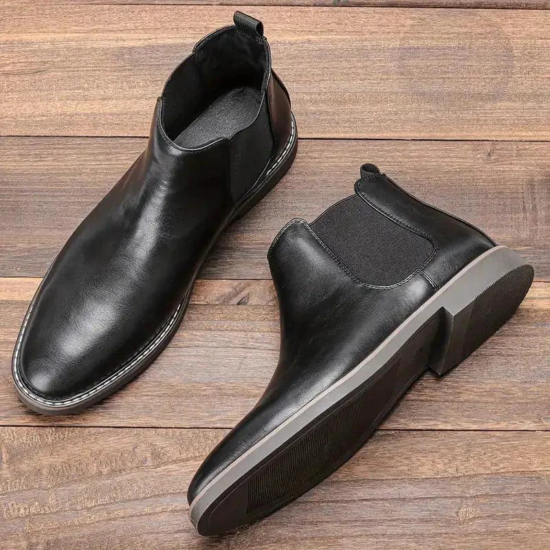 Mandotos Gentleman's Choice leather boots featuring sleek design, brown leather, and sturdy sole for classic men's style.