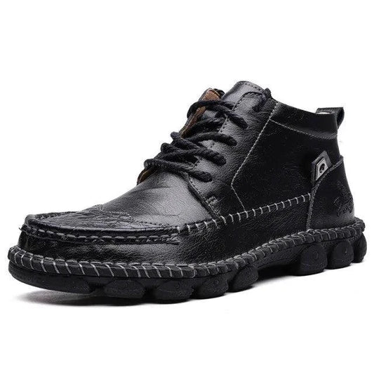Men's leather loafers by MANDOTOS featuring classic design and smooth brown leather with a slip-on style.