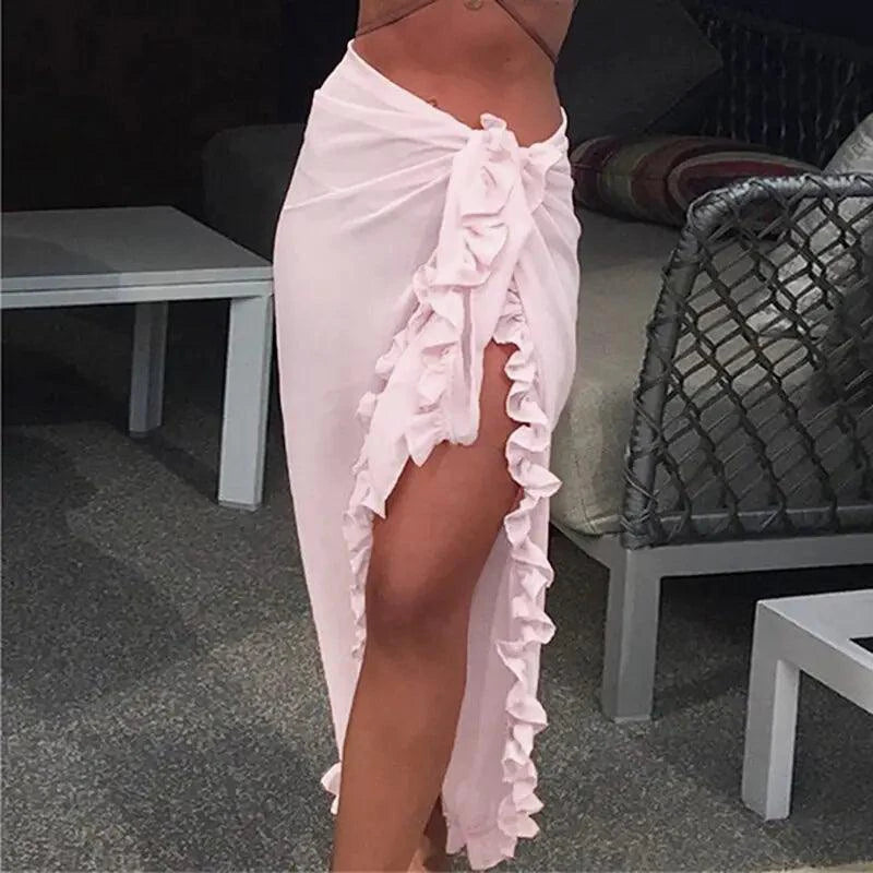 Mandotos GlamourWave chiffon beach wrap draped over a model, showcasing lightweight, elegant fabric for sunny beach days