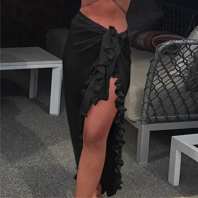 Mandotos GlamourWave chiffon beach wrap draped over a model, showcasing lightweight, elegant fabric for sunny beach days.