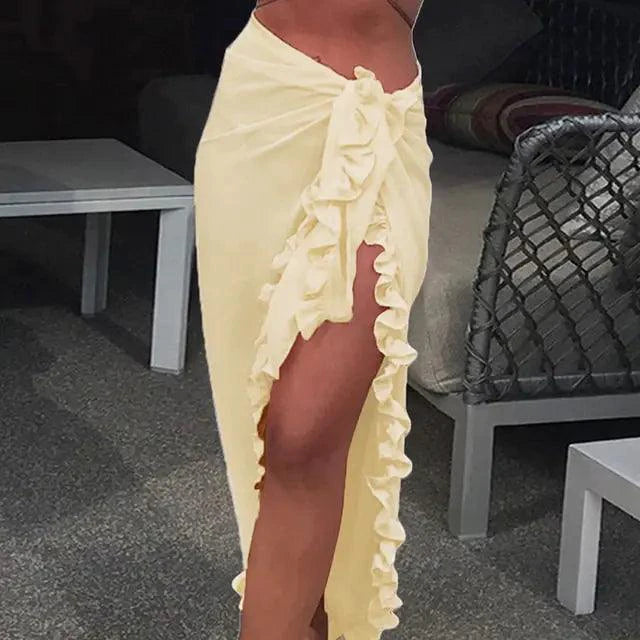 Mandotos GlamourWave chiffon beach wrap draped over a model, showcasing lightweight, elegant fabric for sunny beach days.