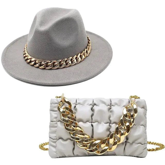 Mandotos gold chain fedora hat with luxurious design and stylish gold chain detail, showcasing a fashionable accessory.