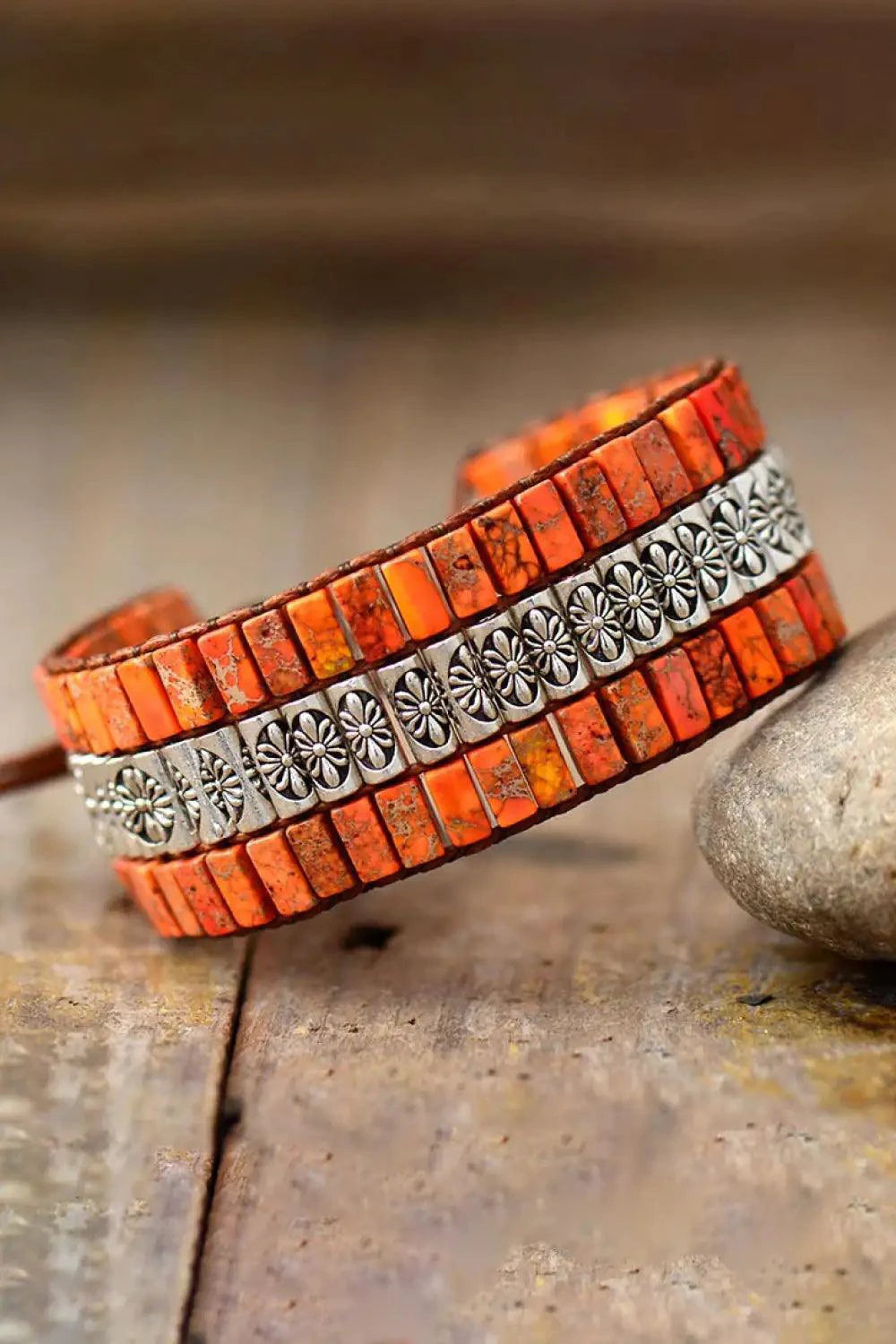 Handmade triple-layer natural stone bracelet by MANDOTOS featuring polished stones and adjustable cord closure.
