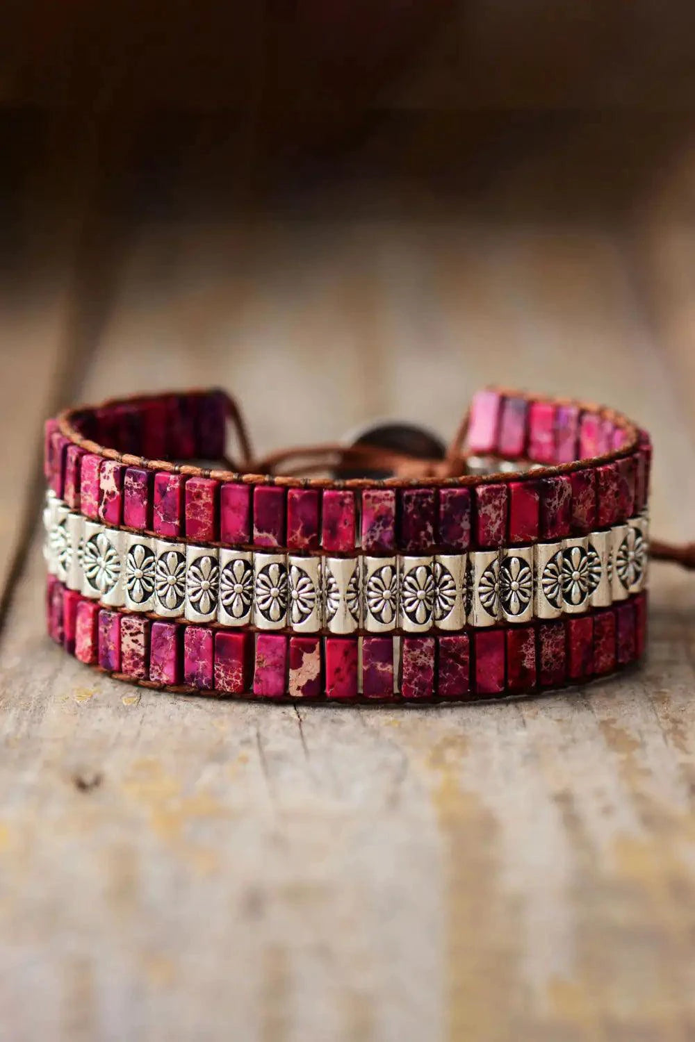 Handmade triple-layer natural stone bracelet by MANDOTOS featuring smooth, multicolored stone beads on an elastic band.