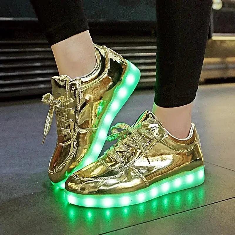 Mandotos LED light-up sneakers with sparkling soles, showcasing illuminated design and vibrant colors for a trendy, eye-catching look.