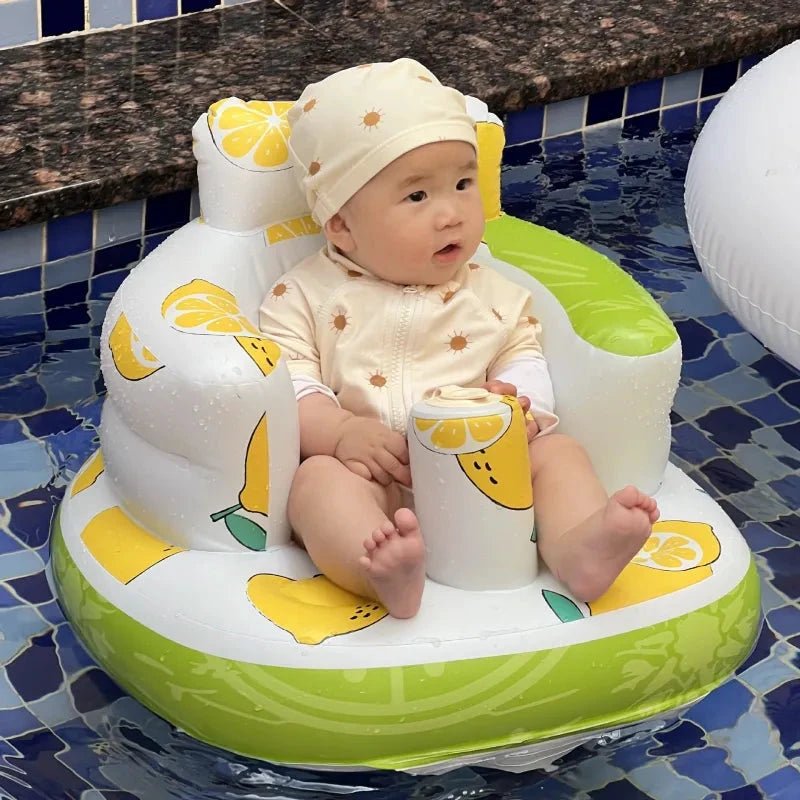 Inflatable baby chair by MANDOTOS designed for dining and bath, featuring a soft, cushioned seat and safety valves.