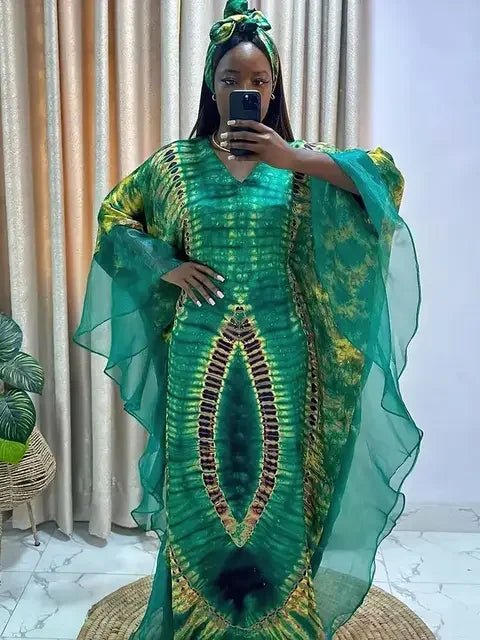 African Dashiki Ankara maxi long dress for women, traditional clothing with vibrant patterns by MANDOTOS INTERNATIONAL.
