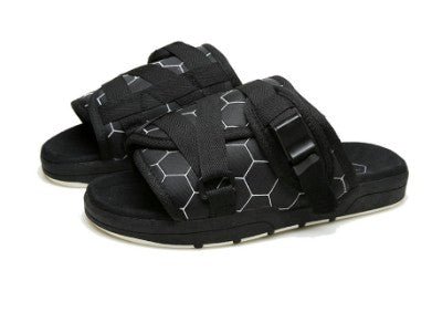 Chic unisex beach slides by MANDOTOS INTERNATIONAL featuring stylish design and comfortable slip-on footwear for beachwear.