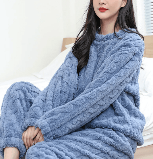 Cozy coral velvet sleepwear set by MANDOTOS INTERNATIONAL, featuring a comfortable long-sleeve top and matching pants.