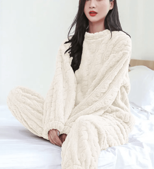 Cozy coral velvet sleepwear set from MANDOTOS INTERNATIONAL, featuring a comfortable top and matching bottoms.