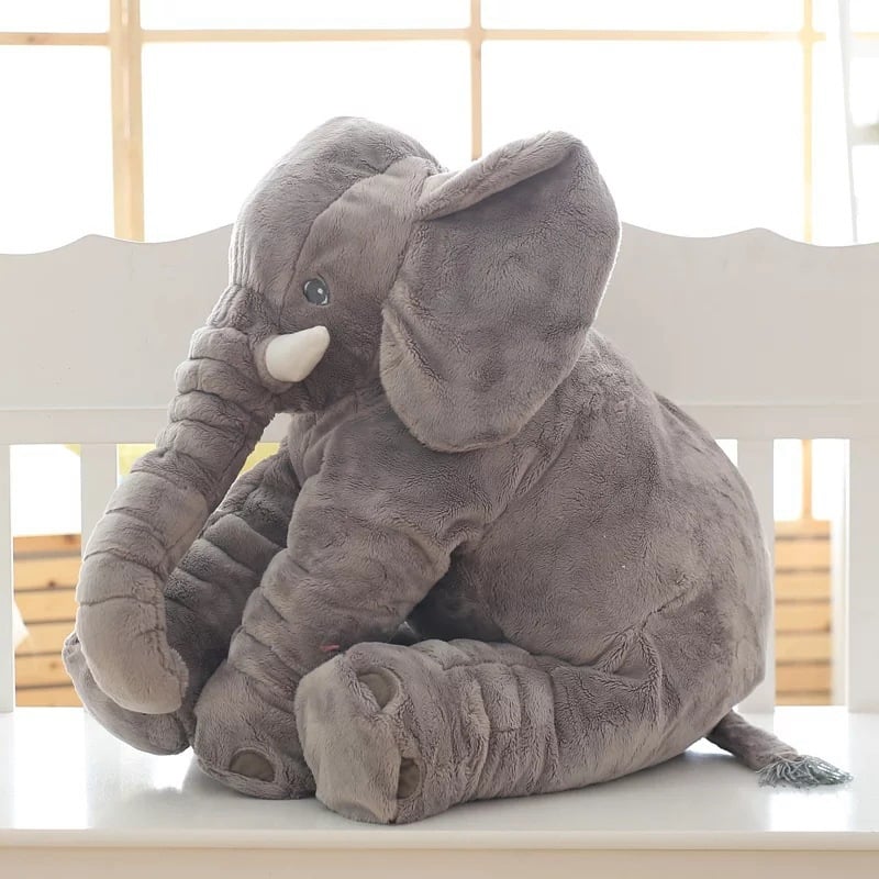 Soft cuddly elephant sleep pal by MANDOTOS INTERNATIONAL, featuring a plush gray elephant with floppy ears for comforting bedtime.