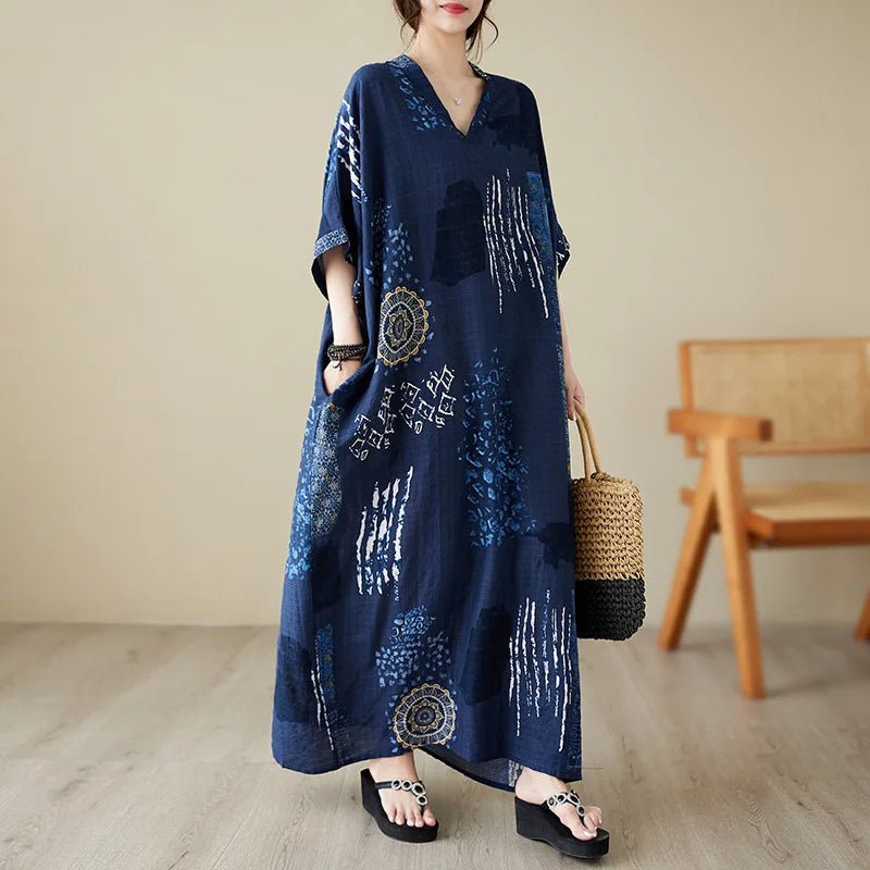 Women’s ethnic bohemian beach dress by MANDOTOS INTERNATIONAL, casual fashion style with vibrant patterns and flowing fabric.