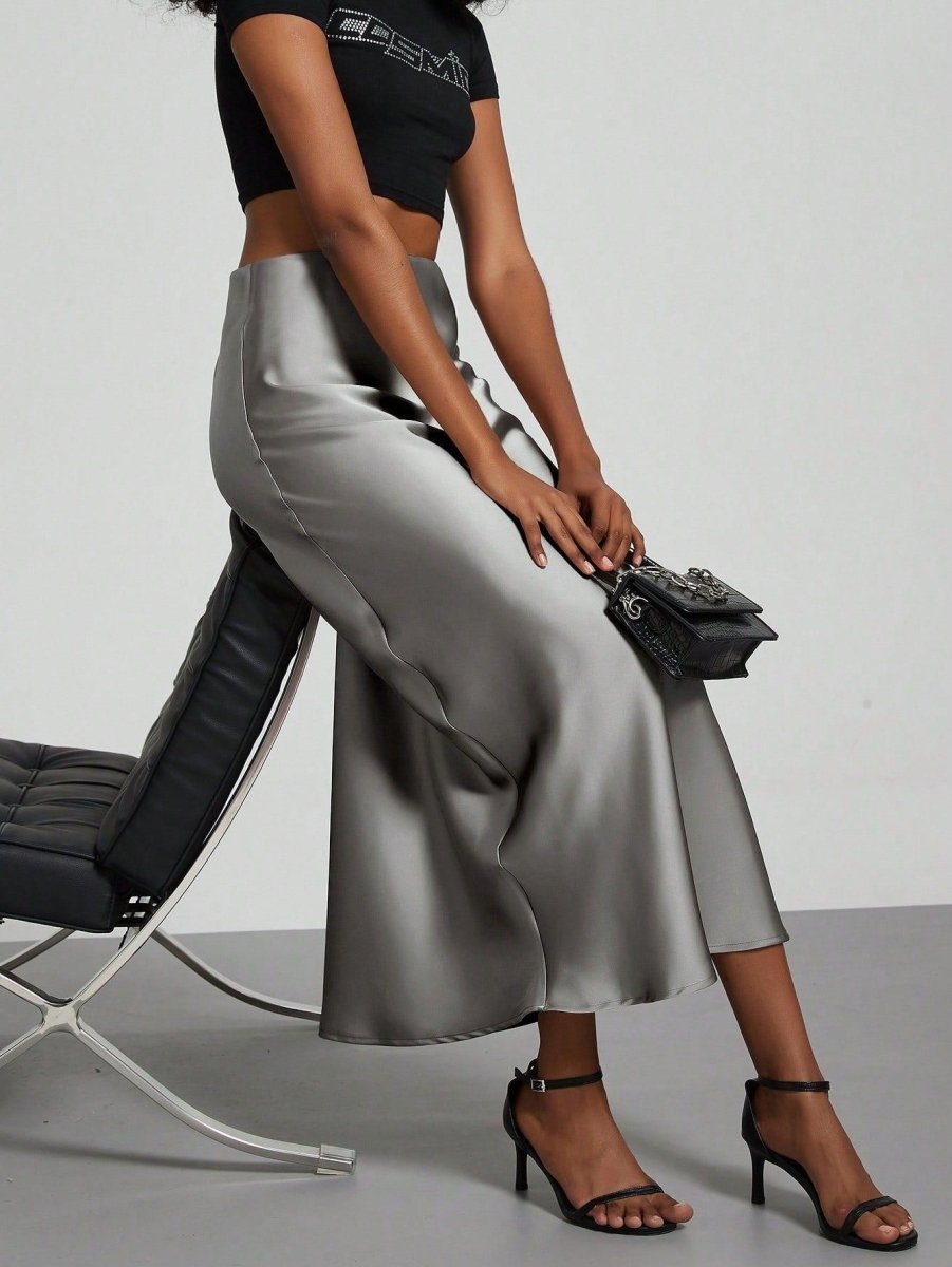 European American style satin midi skirt by Mandotos International, shown in a sleek, elegant design with a smooth satin finish.