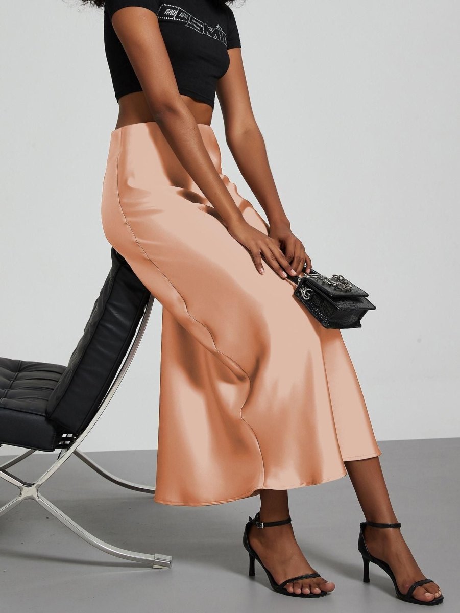 European American style satin midi skirt by MANDOTOS INTERNATIONAL, featuring a smooth fabric and elegant design.