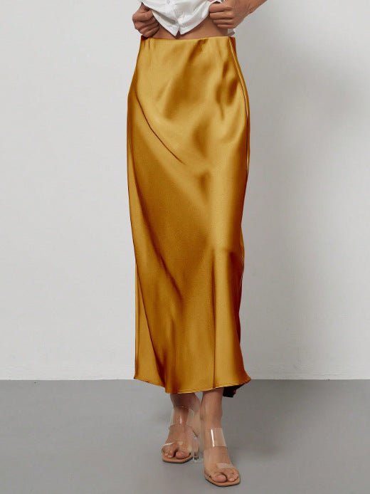European American style satin midi skirt by MANDOTOS INTERNATIONAL, shown in a stylish, flowing design with a smooth satin finish.