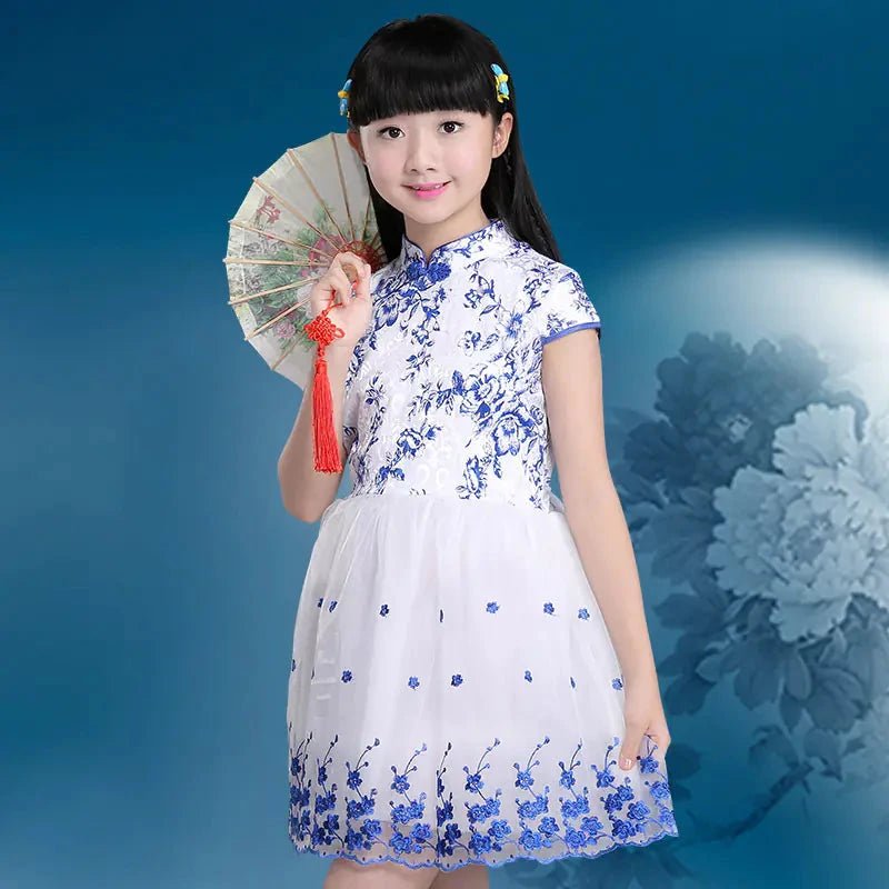 Colorful kids' summer dress from MANDOTOS INTERNATIONAL, featuring playful patterns and lightweight fabric for warm weather.