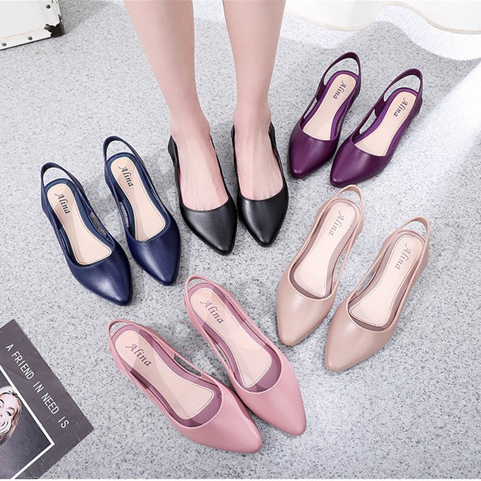 Korean style mid-low heel jelly sandals for women by MANDOTOS INTERNATIONAL, featuring clear, glossy plastic straps and comfortable sole.