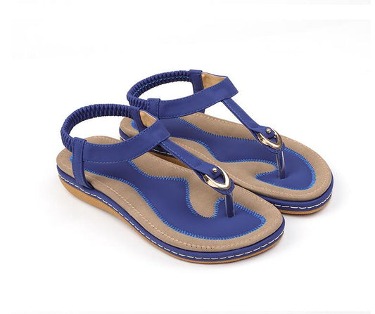 Ladies' chic beach flip flops by MANDOTOS INTERNATIONAL with stylish straps and comfortable sole, perfect for summer outings.