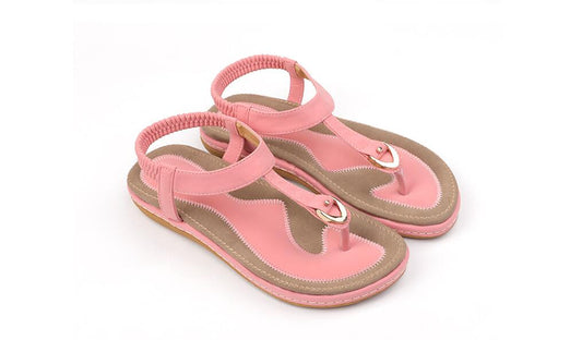 Ladies' chic beach flip flops by MANDOTOS INTERNATIONAL featuring stylish straps and comfortable soles.