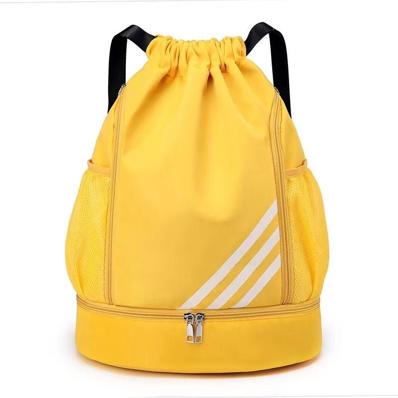 Large capacity basketball backpack by MANDOTOS INTERNATIONAL with drawstring closure and multiple pockets for storage.