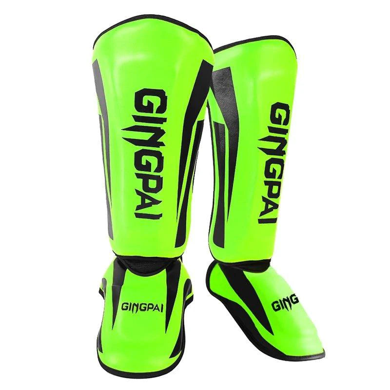 Mandotos kickboxing shin guards for Muay Thai, padded leg protectors with adjustable straps for secure fit during training.