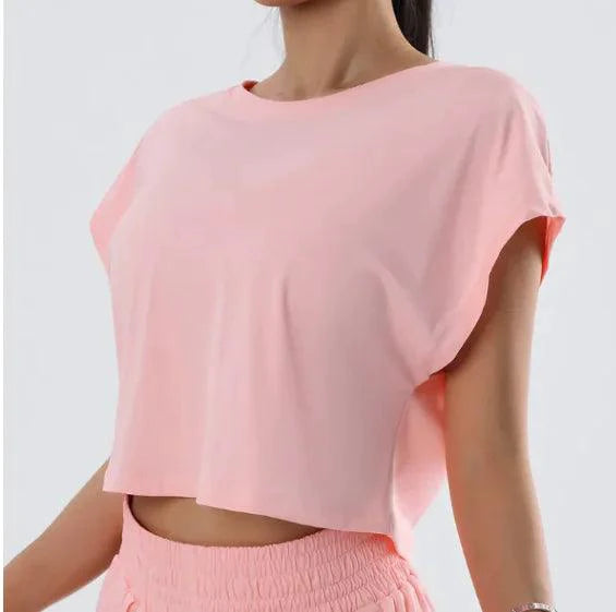 Light pink Ladies' Summer Breeze Tee by MANDOTOS featuring a relaxed fit and soft cotton fabric, perfect for warm weather.
