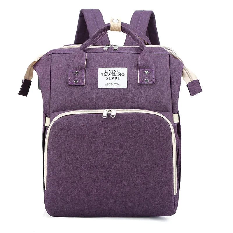Large-capacity MANDOTOS Mommy Bag with multiple compartments and sturdy handles for easy carrying and organization of baby essentials.
