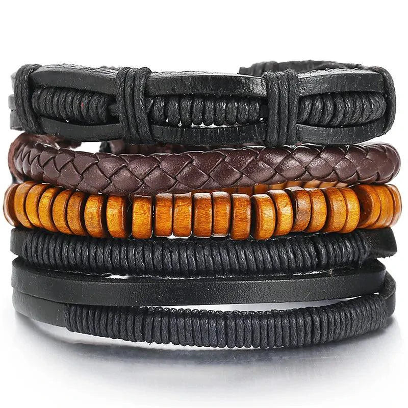Layered leather charm bracelet by MANDOTOS featuring multiple leather strands and decorative metal charms.