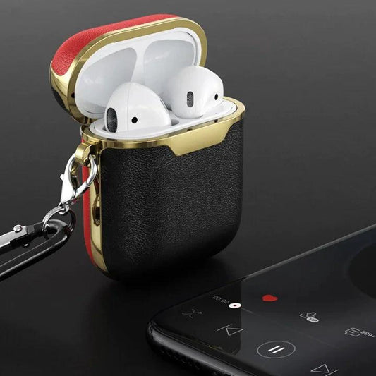 Mandotos leather case for AirPods with secure snap closure and smooth black leather finish.