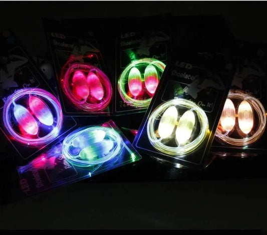 Mandotos LED light-up shoelaces glowing in the dark, vibrant and flexible for stylish, illuminated footwear.