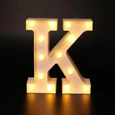 Mandotos luminous letter lights spelling out a word, illuminated in warm glow, perfect for modern home decor or bedroom decoration.
