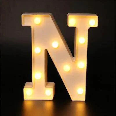 Mandotos luminous letter lights spelling out decorative letters, glowing softly for cozy room decor.