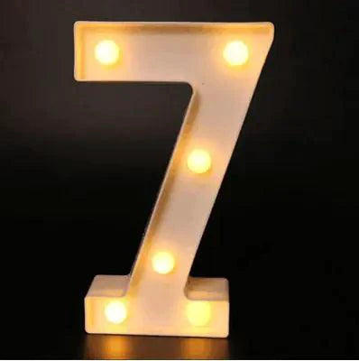 Mandotos luminous letter lights spelling out "LOVE" in warm white glow, ideal for home decor or room decoration.