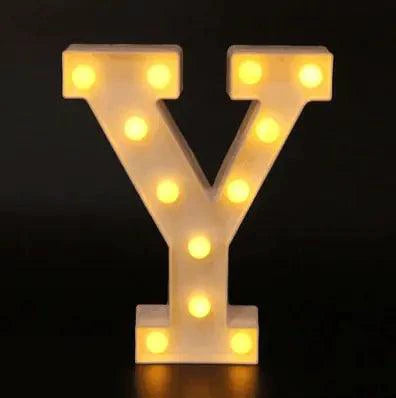 Mandotos luminous letter lights spelling out a word, mounted on a wall with a warm glow, ideal for room decor.