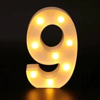 Mandotos luminous letter lights spelling out a word, illuminated with warm white LED glow, ideal for room decor or party ambiance.