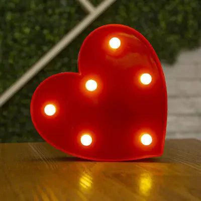 Mandotos luminous letter lights spelling out a word, mounted on a wall for decorative lighting in a modern room decor setting.
