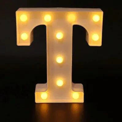 Mandotos luminous letter lights spelling out a decorative word, illuminated against a cozy background.