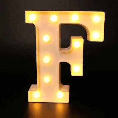 Mandotos luminous letter lights spelling out a word, with a warm glow, ideal for room decor or personalized lighting displays.