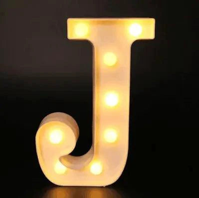 Mandotos luminous letter lights spelling out a word, glowing softly with warm light, perfect for decorative lighting.