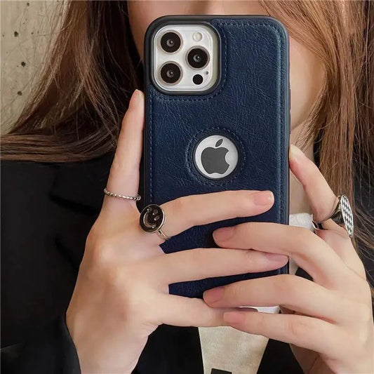 Luxurious black leather sleeve by MANDOTOS, featuring smooth texture and sleek design for stylish protection of devices or accessories.