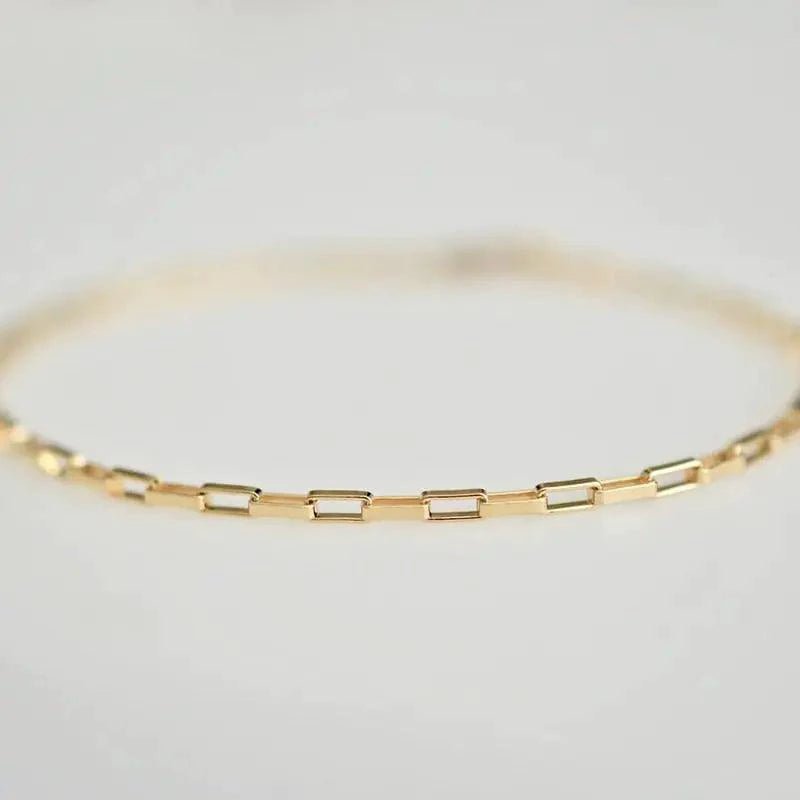 Handcrafted luxury gold chain bracelet by MANDOTOS featuring intricate links and a polished finish.