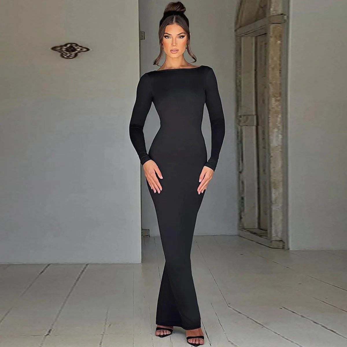 Mandotos Chic backless silk dress in soft milk silk fabric, elegant evening wear with a sleek, flowing design.