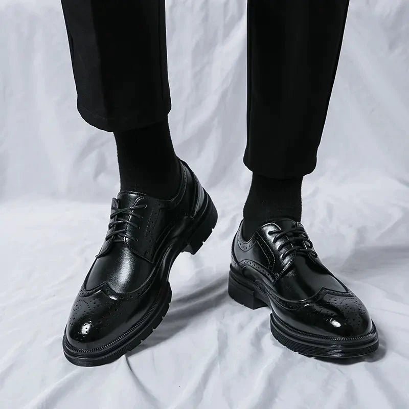 Men's elegant breathable tassel loafers by MANDOTOS, featuring sleek design and comfortable leather material.