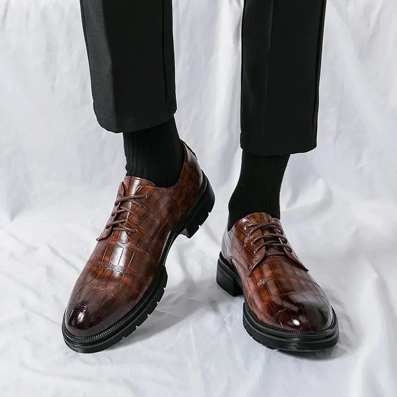Men's elegant breathable tassel loafers by MANDOTOS, featuring sleek design and comfortable fit in a classic style.