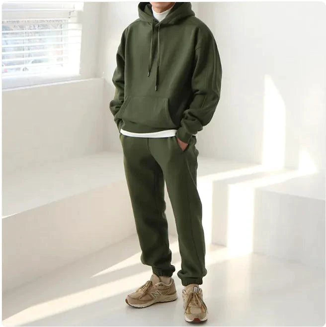Men's hooded sports sweatshirt by MANDOTOS, showing a comfortable fit with a front pouch pocket and adjustable hood.