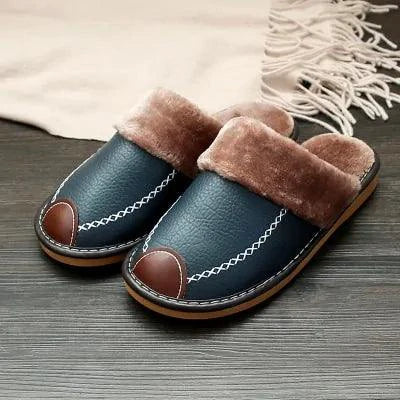 Men's luxury leather slippers by MANDOTOS featuring soft leather and comfortable slip-on design for elegant indoor wear.