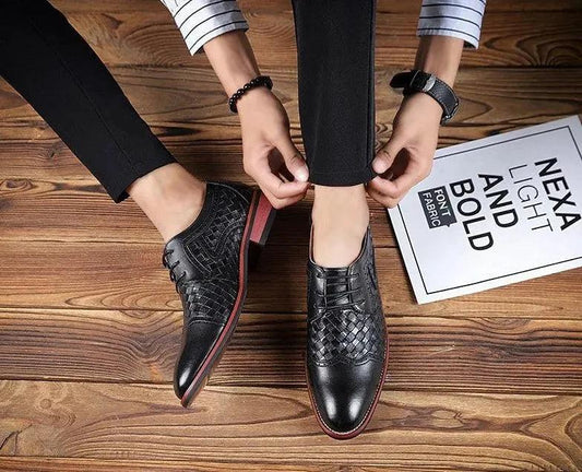 Men's pointed leather dress shoes by MANDOTOS, Korean style fashion, showcasing sleek black leather with sharp pointed toe design.