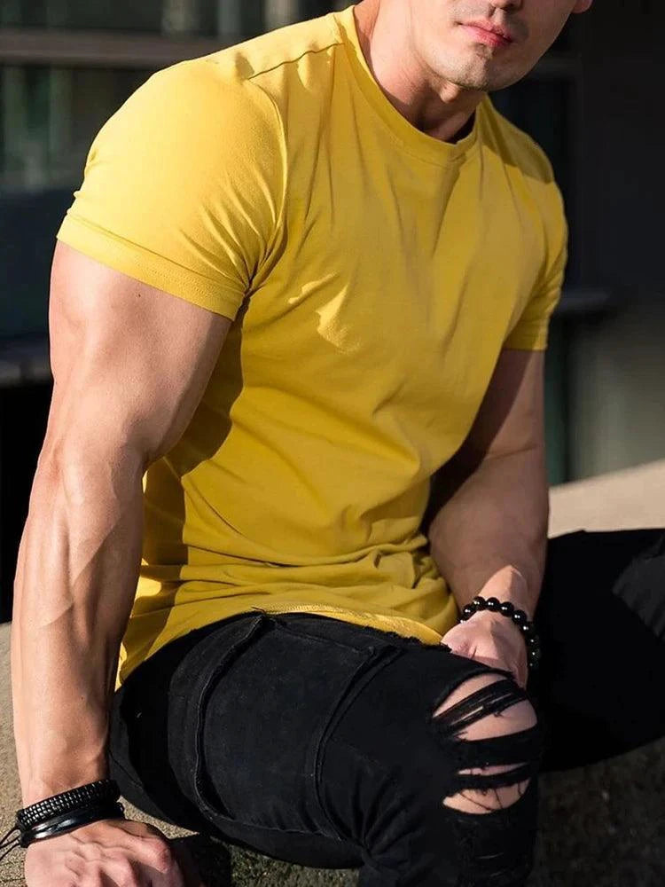 Mandotos men's summer muscle T-shirt for gym workouts, fitted athletic shirt with sleeveless design and breathable fabric.